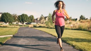 Pregnant woman running