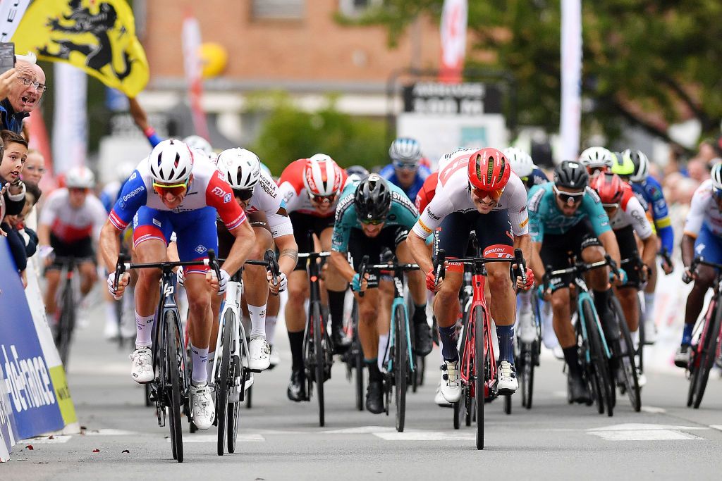 ISBERGUES FRANCE SEPTEMBER 18 LR Arnaud Demare of France and Team Groupama FDJ Marc Sarreau of France and Ag2R Citroen Team and Edward Theuns of Belgium and Team Trek Segafredo sprint to win during the 76th Grand Prix dIsbergues Pas de Calais 2022 a 1976km one day race from Isbergues to Isbergues GPIsbergues on September 18 2022 in Isbergues France Photo by Luc ClaessenGetty Images
