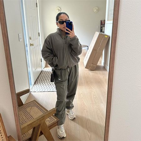 natalie wears matching tracksuit in a mirror selfie