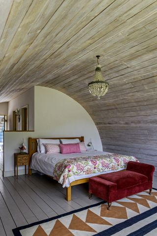 wood clad curved ceiling in bedroom extension
