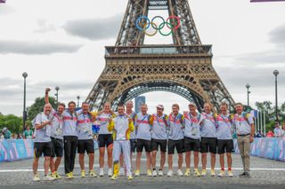 Paris, France - Men’s Road Race - Remco Evenepoel (Belgium) celebrates winning the Men's Road Race to become Olympic Champion in front of The Eiffel Tower with the two gold medals he has won at the Paris 2024 Olympic Games (Time Trial and Road Race) with his team