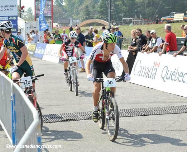 Ralph N&auml;f (Switzerland) and Mical Dyck (Canada) head out at the same time