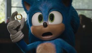 Sonic The Hedgehog confused, holding a ring