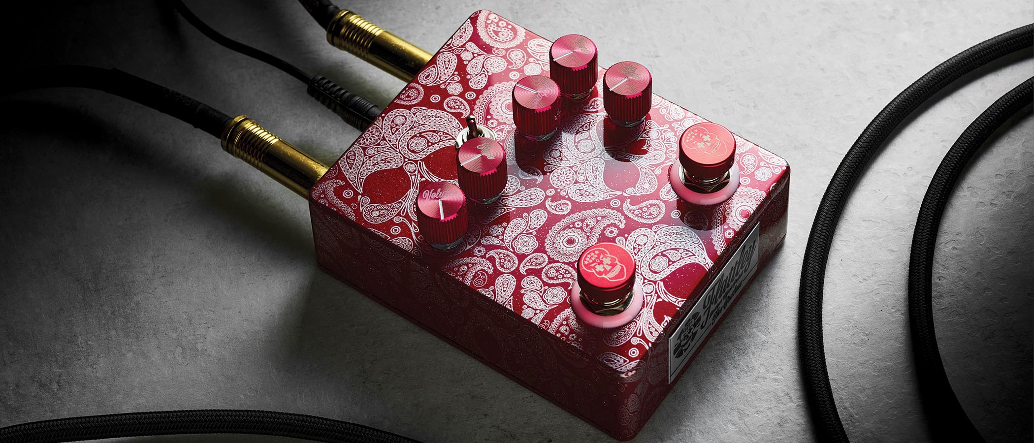 Flattley The Outlaw &ndash; the red-pink boost/drive twofer is decorated in Mexican Day of the Dead inspired graphics