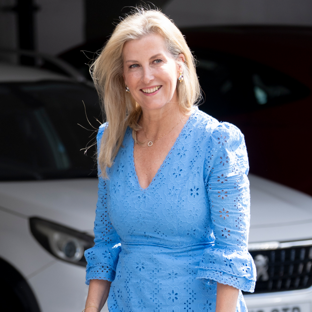 Duchess Sophie wearing a blue eyelet dress smiling