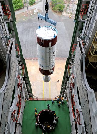 The second stage of India's Polar Satellite Launch Vehicle to launch the country's 100th space mission is moved into place ahead of the Sept. 9, 2012, launch from Satish Dhawan Launch Center.