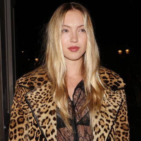 Lila Moss attends Beyonc&eacute;'s 'Cowboy Carter' concert in cowboy boots and a Prada cowhide bag.