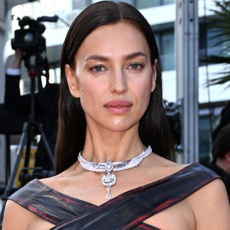 Irina Shayk wears a diamond necklace and a dress with a criss-cross neckline at the 76th annual Cannes film festival on May 21, 2023