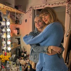 Taylor Swift and Cara Delevingne hug backstage at the cabaret performance in london