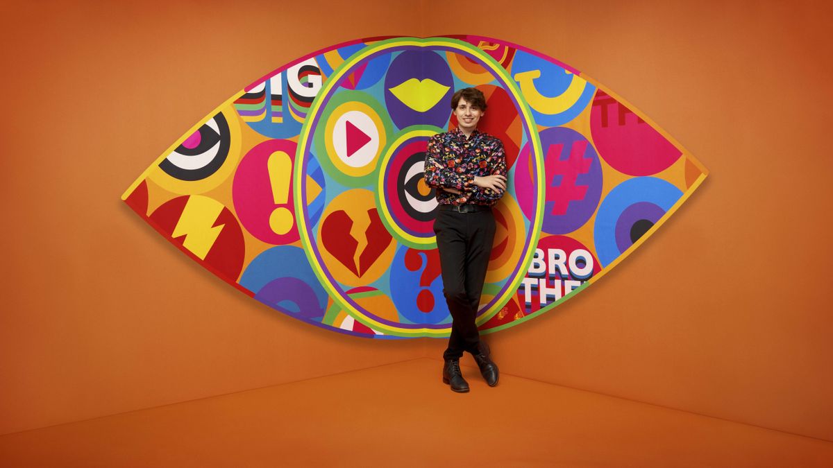 Jordan in front of the Big Brother logo.