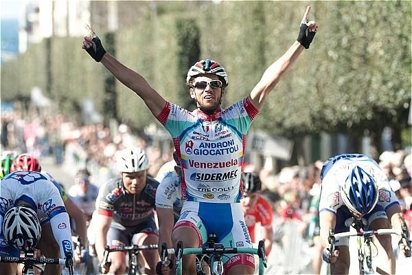 Roberto Ferrari (Androni Giocattoli) crosses the line first