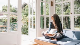 Image of woman and open door