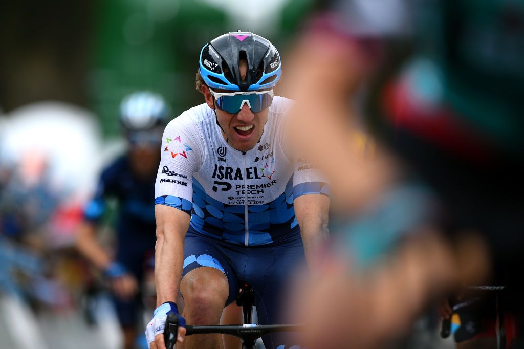 ZINAL VAL DANNIVIERS SWITZERLAND APRIL 30 Michael Woods of Canada and Team Israel Premier Tech crosses the finish line during the 75th Tour De Romandie 2022 Stage 4 a 1801km stage from Aigle to Zinal Val dAnniviers 1664m TDR2022 on April 30 2022 in Zinal Val dAnniviers Switzerland Photo by Dario BelingheriGetty Images