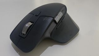 A Logitech mouse on a desk