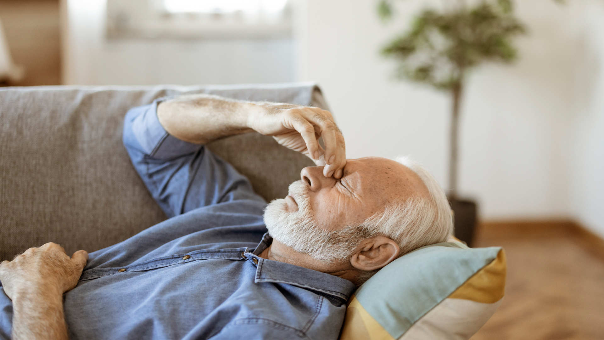 man lying on the sofa