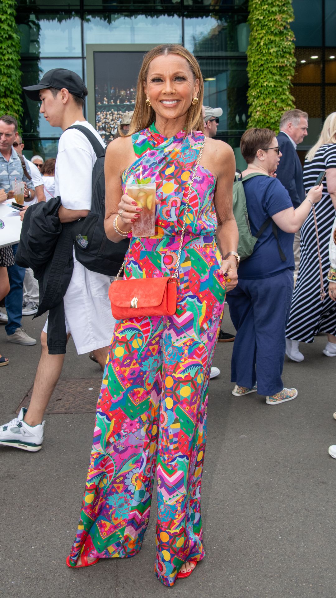 vanessa williams wearing a bright and patterned co-ord at wimbledon