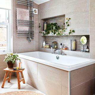 Simple brown bathroom with built in bath