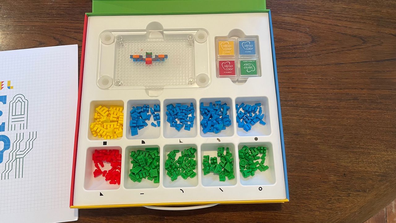 Prixel stamp kit inside showing lots of different bits to make stamps with
