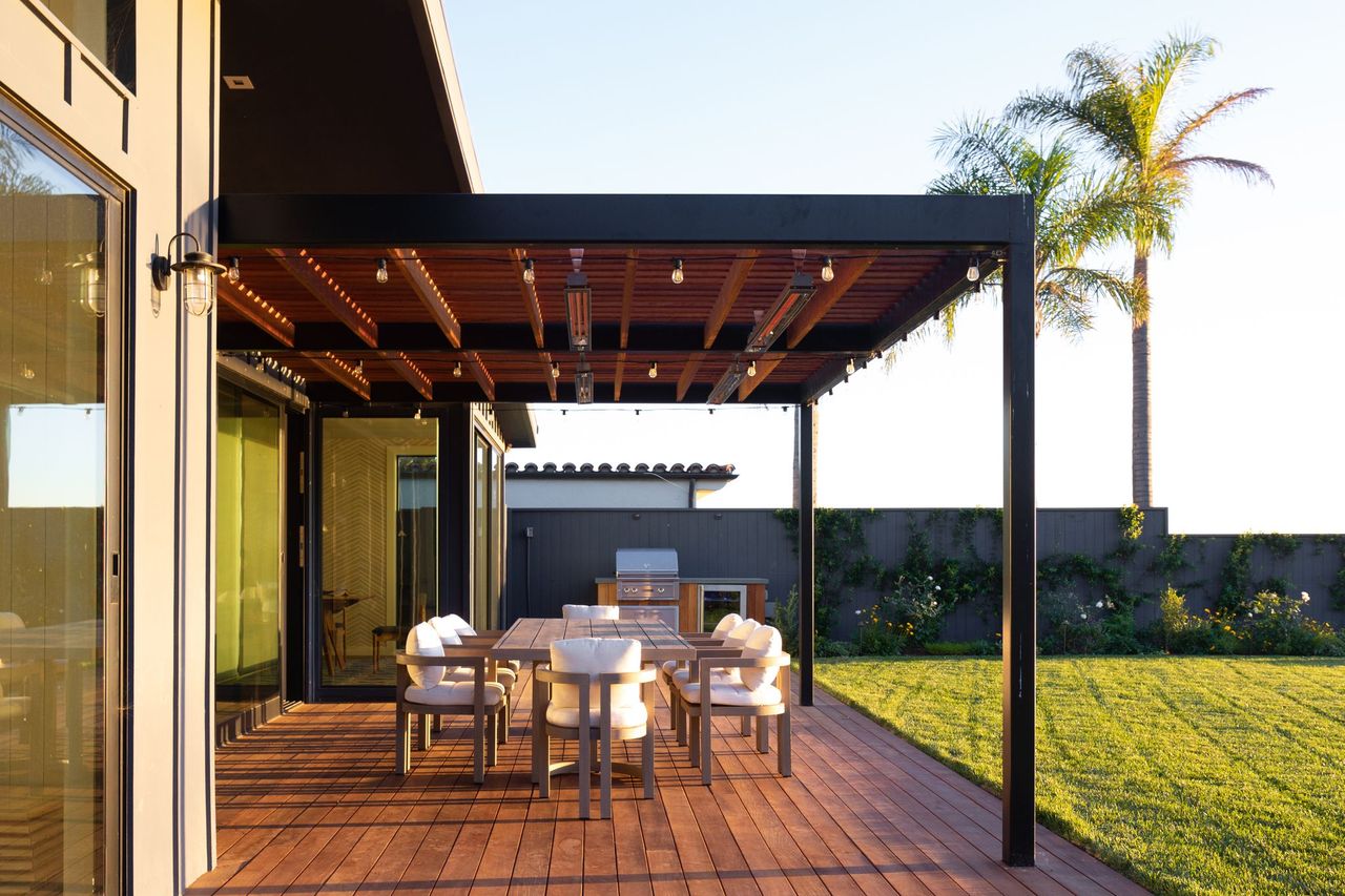 lawn vs deck: pergola on deck in garden backyard by Kate Anne Designs