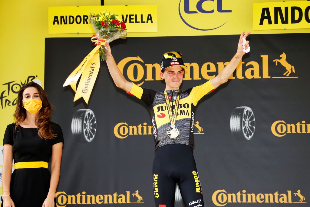 ANDORRELAVIEILLE ANDORRA JULY 11 Sepp Kuss of The United States and Team JumboVisma stage winner celebrates at podium during the 108th Tour de France 2021 Stage 15 a 1913km stage from Cret to AndorrelaVieille Hostess LeTour TDF2021 on July 11 2021 in AndorrelaVieille Andorra Photo by Chris GraythenGetty Images