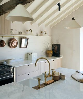 modern country style kitchen from deVol with a natural colour palette