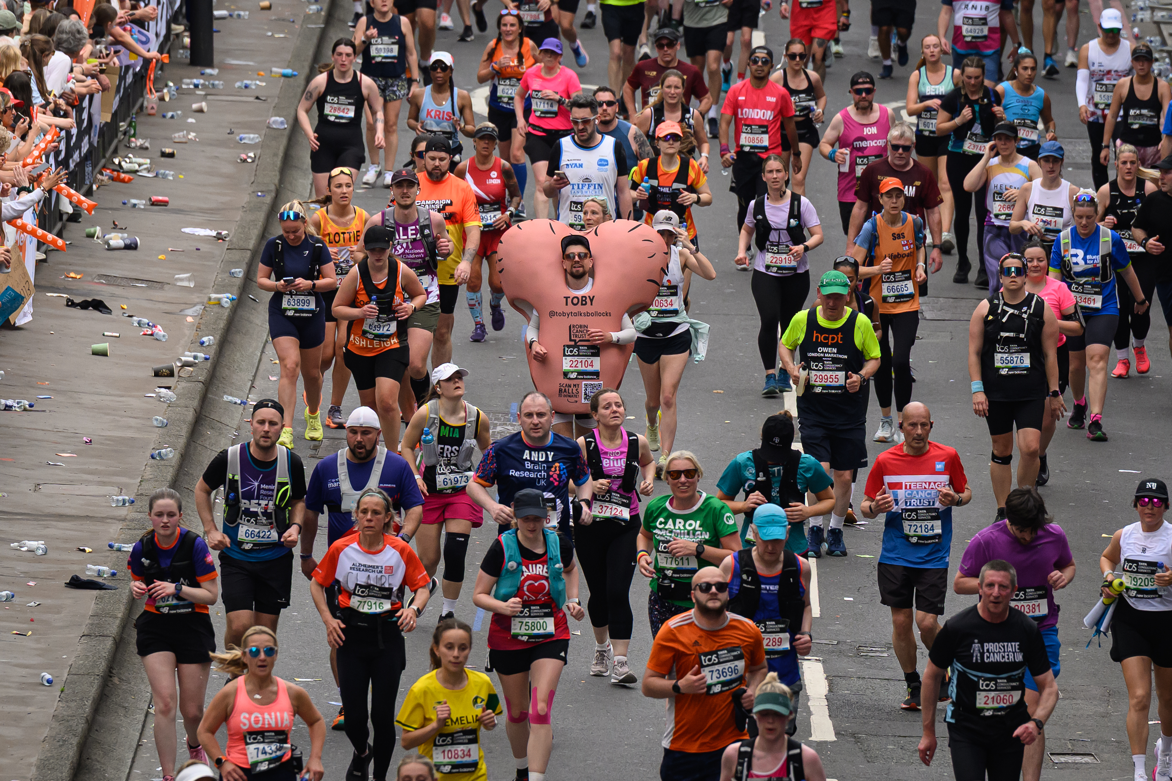 A man wearing a testicle costume takes part in the TCS London Marathon 2025 April 27, 2025 in London, England. The London Marathon was founded by athletes Chris Brasher and John Disley in 1981 and runs over a flat course set around the River Thames, starting in Blackheath and finishing at The Mall.
