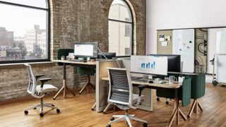 Steelcase desks and chairs in an office environment