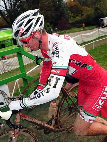 Troy Wells (Clif Bar) climbing the green monster.