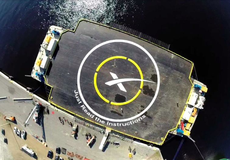 This photo, tweeted by SpaceX CEO Elon Musk on Jan. 29, 2015, shows personnel painting on the name of the company&#039;s first spaceport drone ship: &quot;Just Read the Instructions.&quot; 