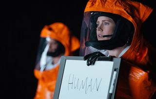 Arrival Amy Adams orange hazmat suit