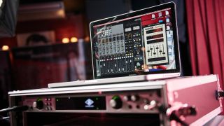 A MacBook Pro on top of an audio interface