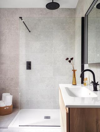 Walk-in shower ideas with muted colors in a shower room
