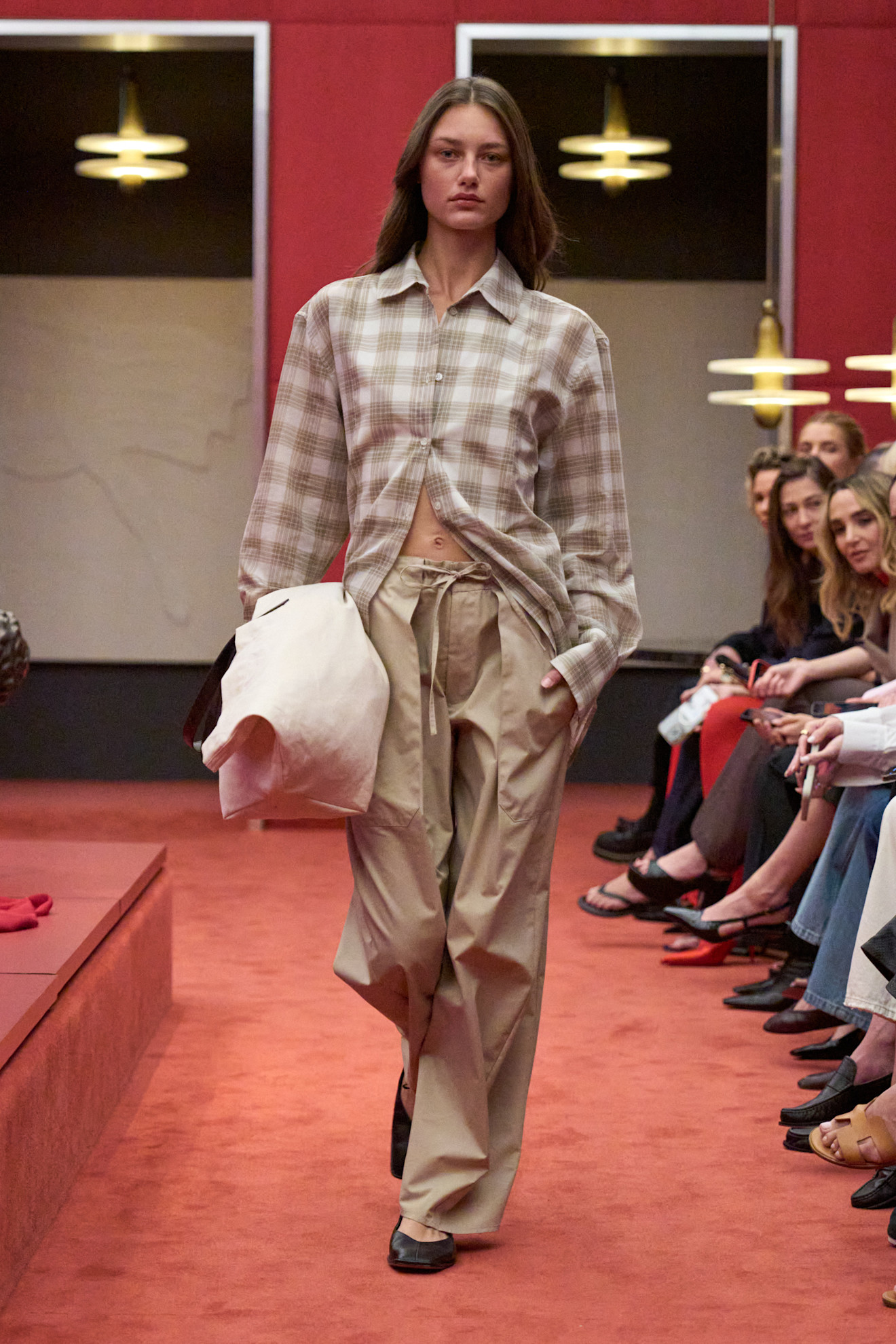 An image of the flannel shirt trend on the Kallmeyer runway.