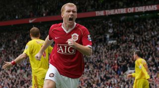 Paul Scholes celebrates after scoring for Manchester United against Liverpool