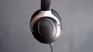 The AceZone A-Spire gaming headset on a grey background.