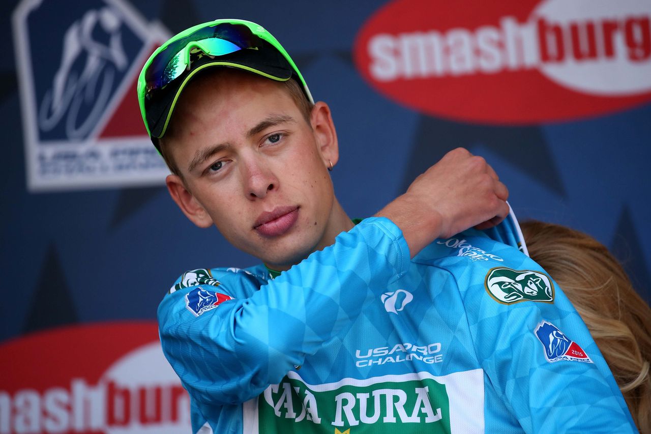 Best young rider Hugh Carthy (Caja Rural) pulls on the blue jersey