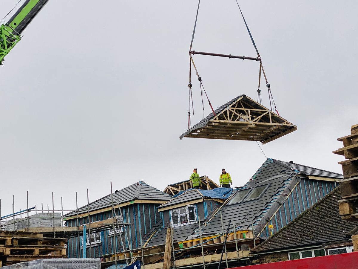 module being craned into bungalow loft conversion