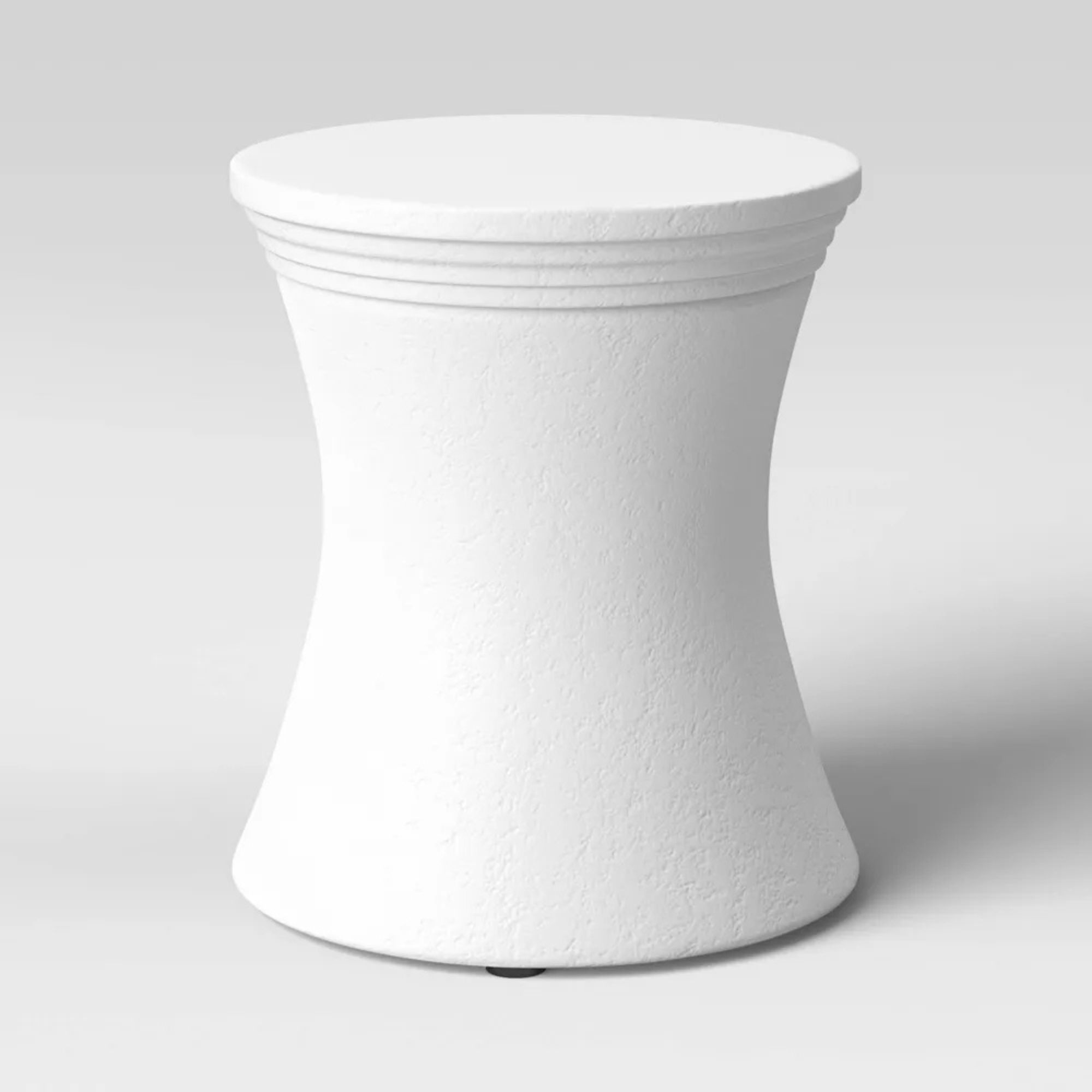 Small faux white stone outdoor table