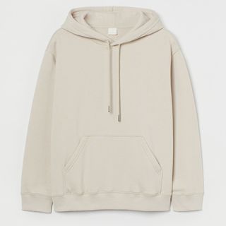 hooded tops like this beige one go great with puffer gilets