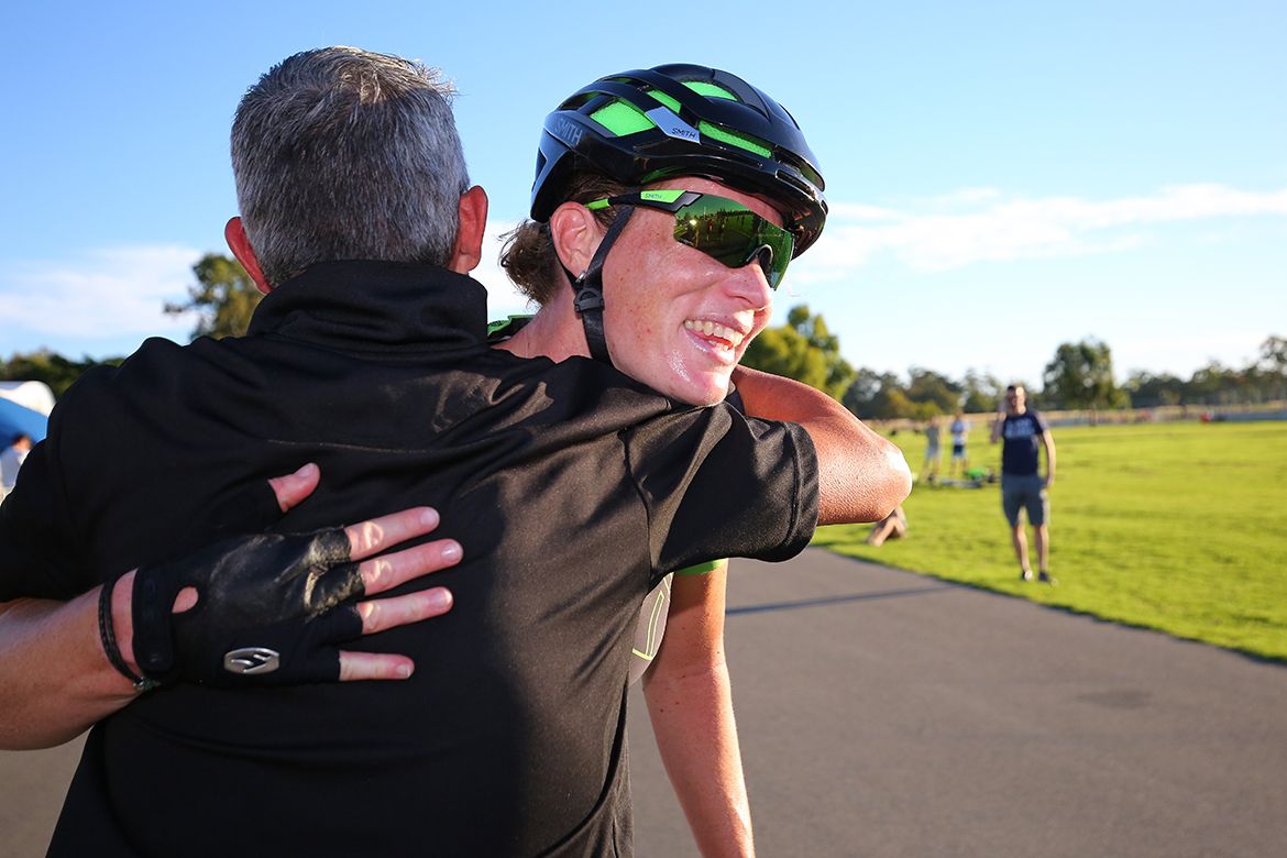 Kirsten Wild gets a hug after her victory