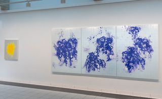 one yellow and three blue flower paintings on gallery wall, from Jean-Michel Othoniel 'Under an Endless Light'