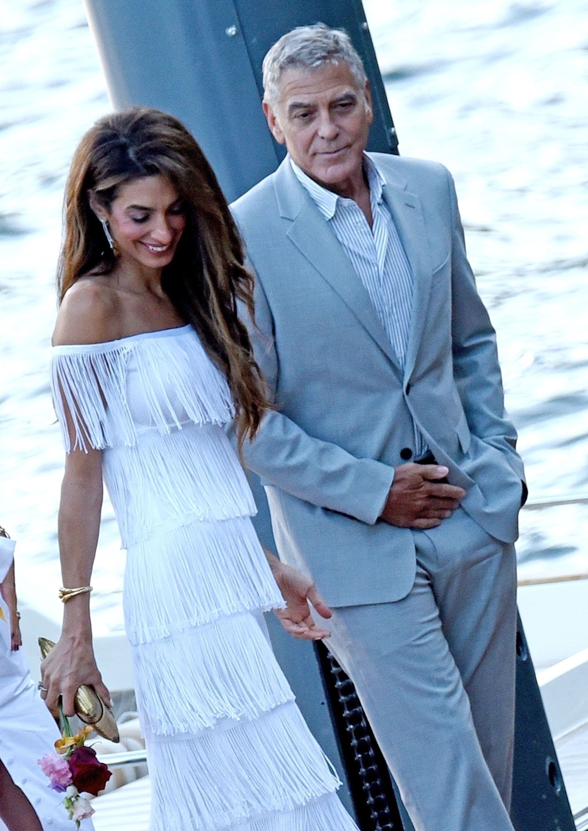 Amal and George Clooney arrive in style at Villa Passalacqua ahead of exclusive Justice Foundation event.