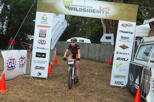Jenni King crossing the line in Strahan.