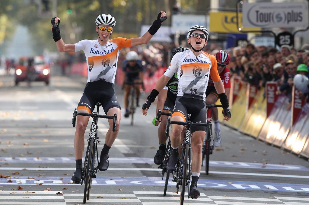 Martijn Tusveld, left, celebrates Sam Oomen's 2015 Paris-Tours victory
