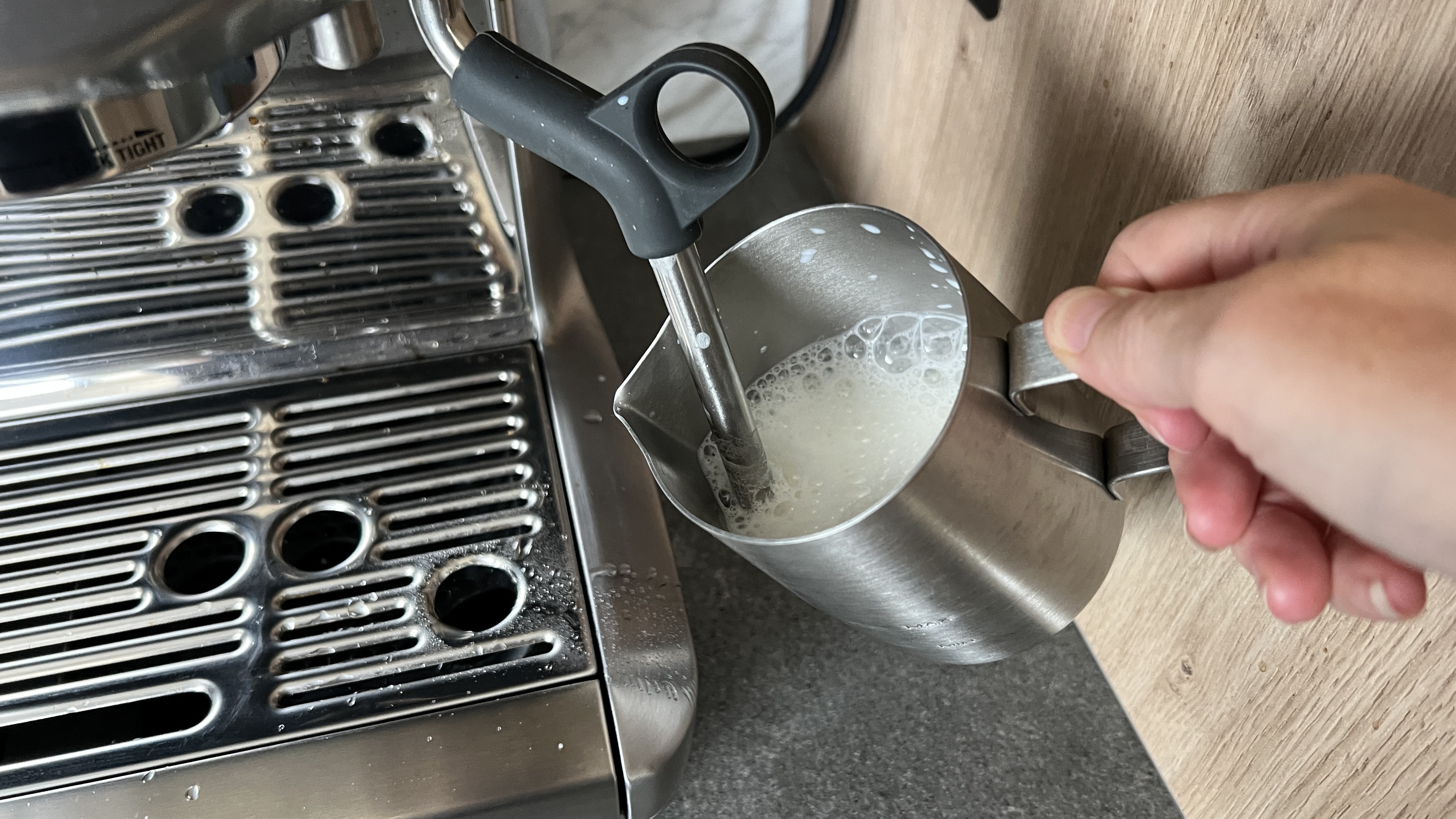 steaming milk with a steam wand