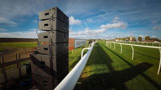The Wharfdale Pro line array system sites track side on a clear, sunny day.