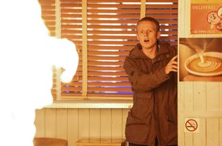 Bobby Beale is confronted by a blaze in the cafe