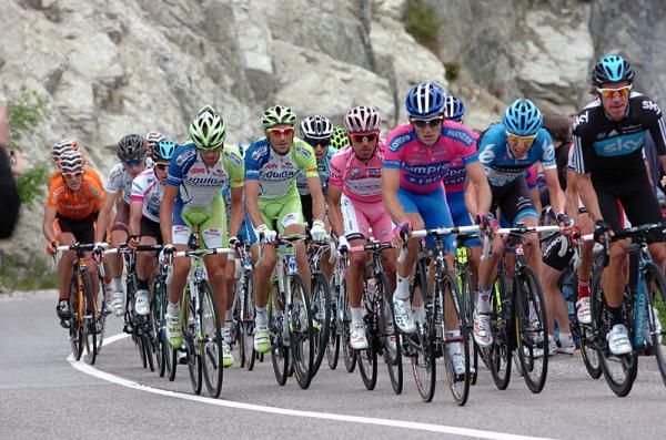 The overall Giro contenders mark each other in the peloton on the climb to the finish.