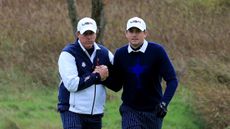 Phil Mickelson and Keegan Bradley shake hands at the 2014 Ryder Cup