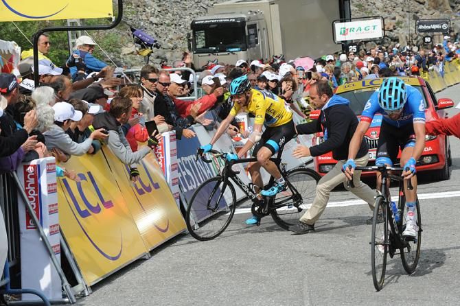 Chris Froome struggles to stay on his bike after a massive effort on the Finaut-&Eacute;mosson